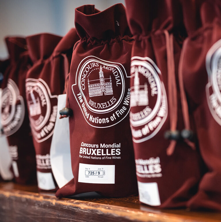 Concours Mondial de Bruxelles red fabric branded bags